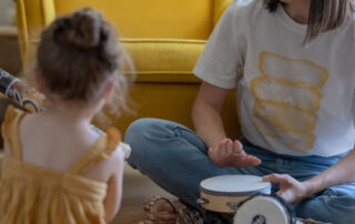 Mom and kid playing | Toronto Relocation Lawyer